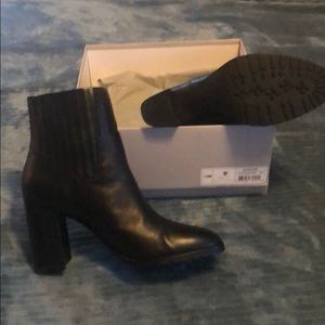 Women’s size 12 3 1/2 inch heel high bootie